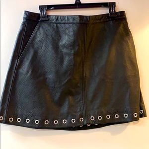 Short skirt with metal detail
